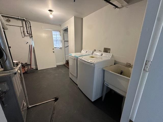 laundry room with laundry area and washer and clothes dryer