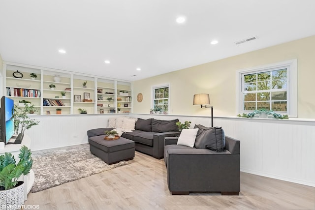 69 N Idlewild Ave, Mundelein, IL 60060 - living area featuring wood finished floors, wainscoting, and recessed lighting