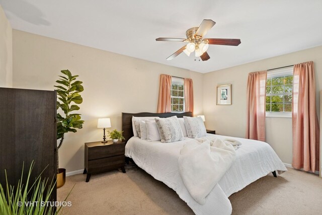 69 N Idlewild Ave, Mundelein, IL 60060 - bedroom featuring light colored carpet, baseboards, and ceiling fan