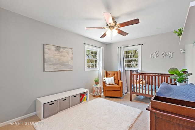 69 N Idlewild Ave, Mundelein, IL 60060 - bedroom with light carpet, baseboards, and ceiling fan
