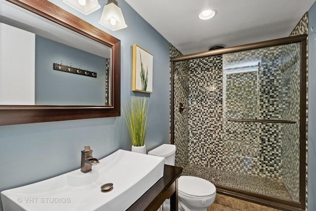 69 N Idlewild Ave, Mundelein, IL 60060 - bathroom with toilet, a stall shower, vanity, and recessed lighting