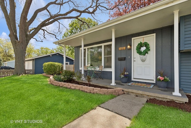 69 N Idlewild Ave, Mundelein, IL 60060 - entrance to property with a porch and board and batten siding