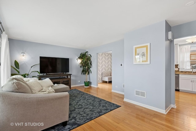 69 N Idlewild Ave, Mundelein, IL 60060 - living area with light wood-type flooring and baseboards