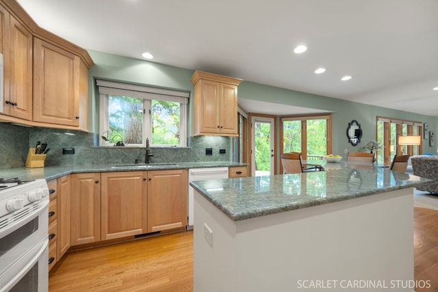 645 Rosewood Dr, West Chicago, IL 60185 - kitchen featuring a sink, white appliances, light wood-style flooring, recessed lighting, and tasteful backsplash