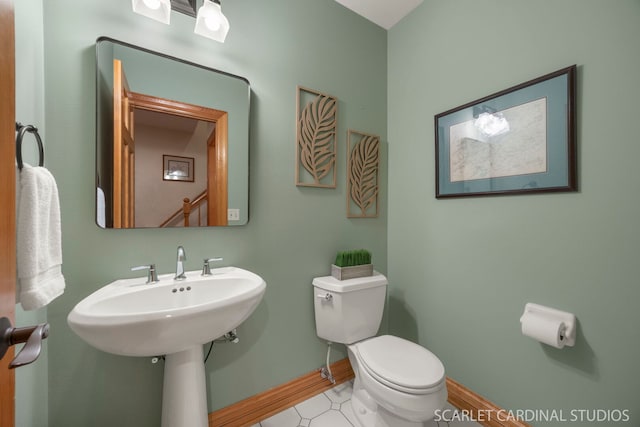 645 Rosewood Dr, West Chicago, IL 60185 - half bathroom featuring toilet and baseboards