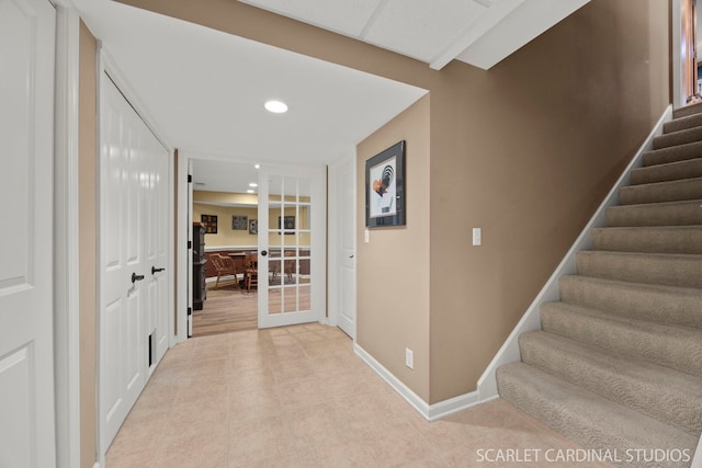 645 Rosewood Dr, West Chicago, IL 60185 - hall featuring stairs, baseboards, recessed lighting, light tile patterned floors, and french doors