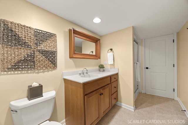 645 Rosewood Dr, West Chicago, IL 60185 - full bathroom with vanity, toilet, a stall shower, baseboards, and tile patterned flooring