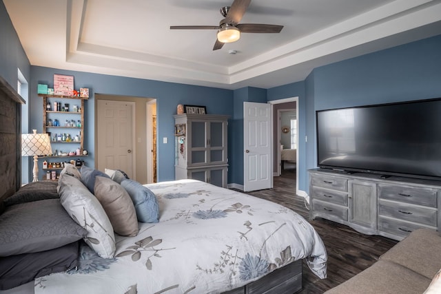 3052 Mosedale St, Elgin, IL 60124 - bedroom featuring baseboards, dark wood finished floors, a dry bar, and a raised ceiling
