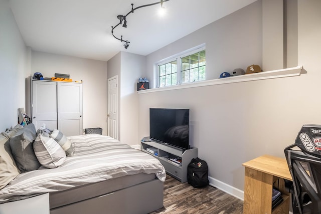 3052 Mosedale St, Elgin, IL 60124 - bedroom featuring baseboards and dark wood-style flooring