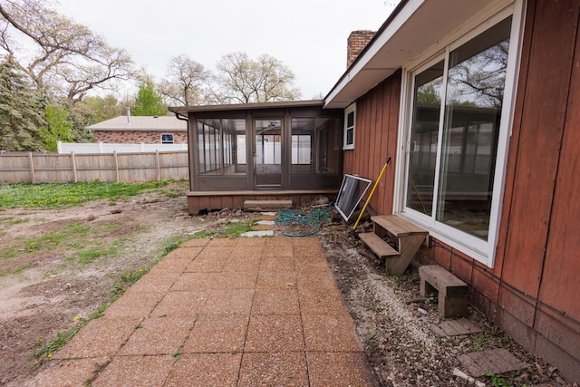 2214 N Bur Oak Ct, Bonfield, IL 60913 - view of yard featuring entry steps, fence, and a sunroom