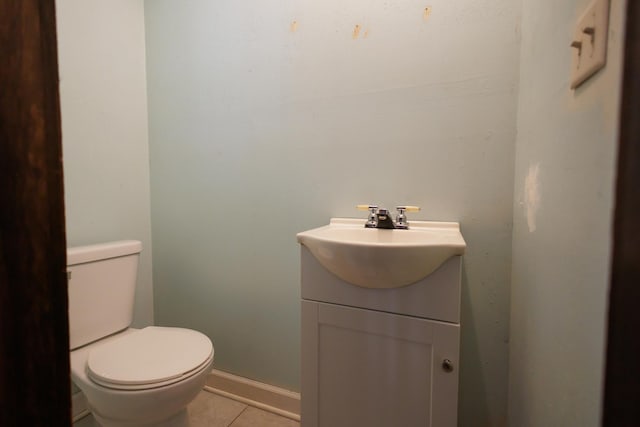 2214 N Bur Oak Ct, Bonfield, IL 60913 - bathroom featuring toilet, tile patterned floors, baseboards, and vanity