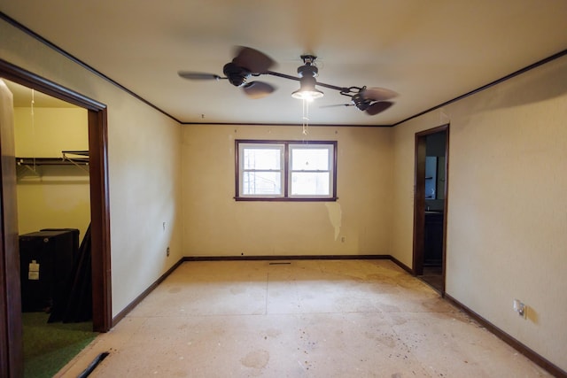 2214 N Bur Oak Ct, Bonfield, IL 60913 - unfurnished bedroom with baseboards, ornamental molding, a closet, and a walk in closet