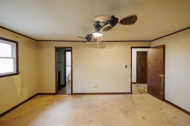 2214 N Bur Oak Ct, Bonfield, IL 60913 - empty room featuring a ceiling fan, baseboards, and ornamental molding