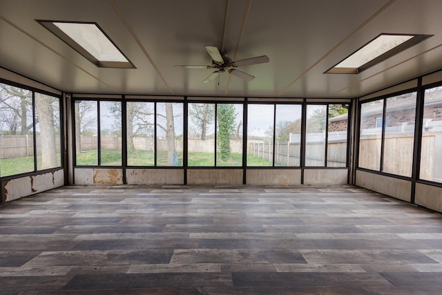 2214 N Bur Oak Ct, Bonfield, IL 60913 - unfurnished sunroom featuring wood finished floors, a wealth of natural light, and a skylight