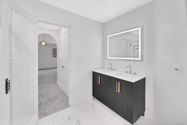 17247 Lakebrook Dr, Orland Park, IL 60467 - bathroom featuring baseboards, a sink, marble finish floor, and double vanity