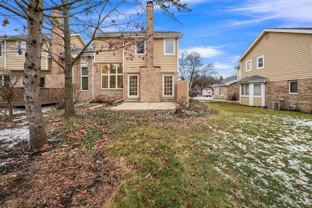17247 Lakebrook Dr, Orland Park, IL 60467 - back of house featuring a chimney, a lawn, brick siding, central AC, and a patio
