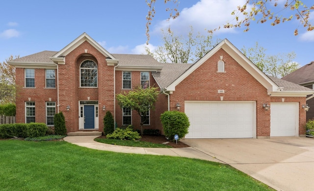 385 N Chalary Ct, Palatine, IL 60067 - colonial house featuring a front yard, brick siding, concrete driveway, an attached garage, and a shingled roof