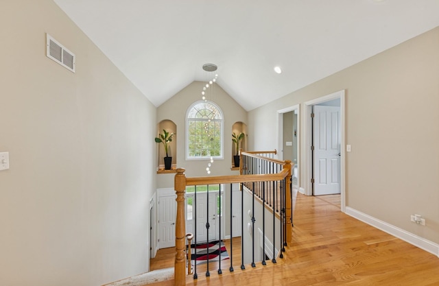 385 N Chalary Ct, Palatine, IL 60067 - hall featuring visible vents, an upstairs landing, light wood-type flooring, baseboards, and lofted ceiling