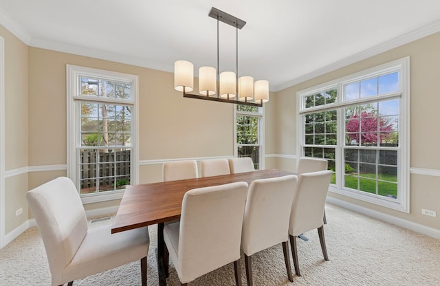 385 N Chalary Ct, Palatine, IL 60067 - dining space featuring crown molding, baseboards, a chandelier, and light carpet