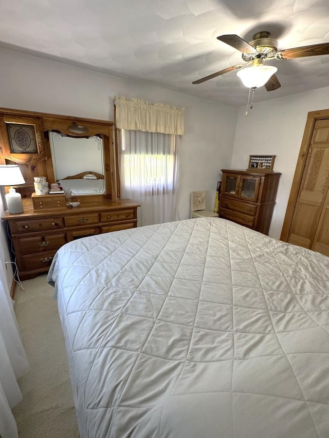 bedroom featuring carpet flooring and ceiling fan