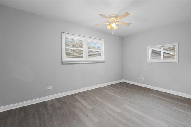 877 163rd St, Calumet City, IL 60409 - spare room featuring baseboards, ceiling fan, and wood finished floors