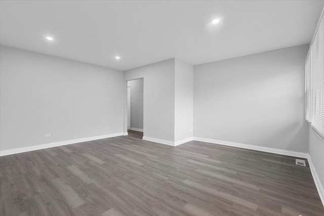877 163rd St, Calumet City, IL 60409 - spare room featuring recessed lighting, baseboards, visible vents, and wood finished floors