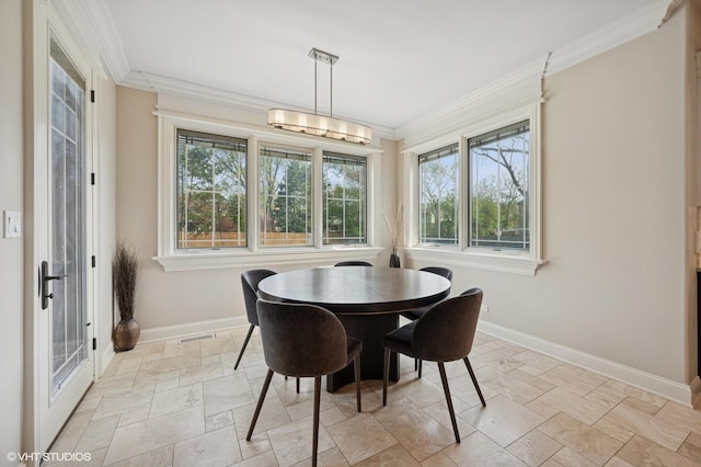 3244 Lakeside Ave, Northbrook, IL 60062 - dining area featuring baseboards, visible vents, ornamental molding, and stone tile flooring
