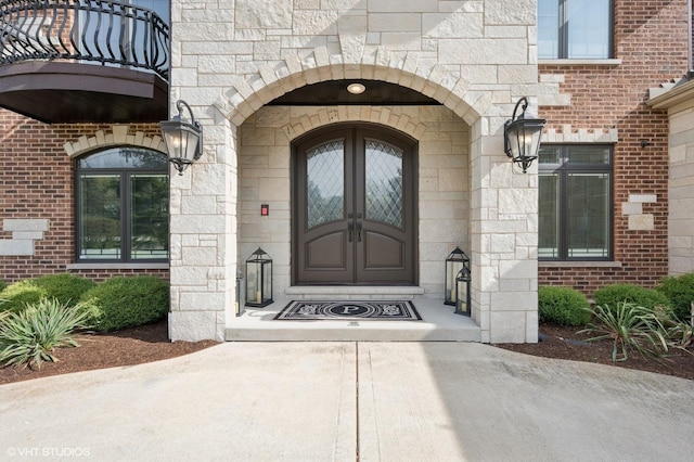 3244 Lakeside Ave, Northbrook, IL 60062 - property entrance with a balcony and stone siding