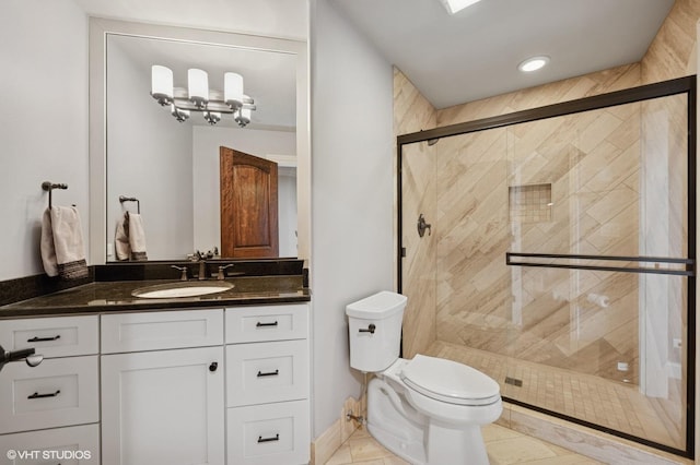 3244 Lakeside Ave, Northbrook, IL 60062 - full bathroom with toilet, a shower stall, tile patterned flooring, and vanity