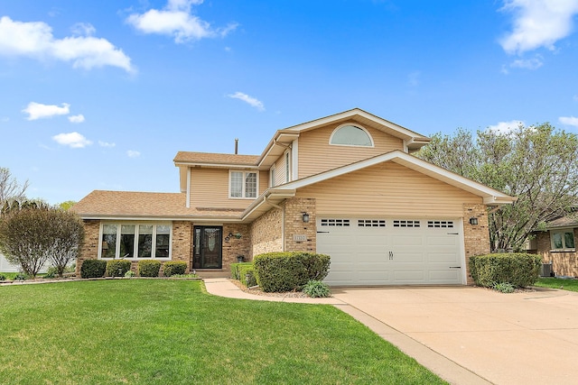 17130 Inverness Dr, Tinley Park, IL 60487 - traditional-style home with roof with shingles, an attached garage, a front lawn, brick siding, and concrete driveway