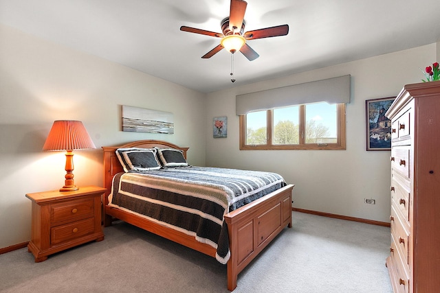17130 Inverness Dr, Tinley Park, IL 60487 - bedroom with baseboards, light carpet, and a ceiling fan
