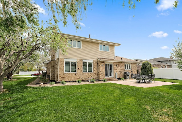 17130 Inverness Dr, Tinley Park, IL 60487 - rear view of property featuring brick siding, a patio area, fence, and a yard