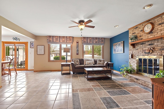 17130 Inverness Dr, Tinley Park, IL 60487 - tiled living area featuring ceiling fan, baseboards, and a fireplace
