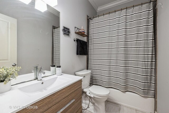4220 S King Dr Unit 2S, Chicago, IL 60653 - full bath featuring crown molding, tile patterned flooring, shower / bath combo, vanity, and toilet