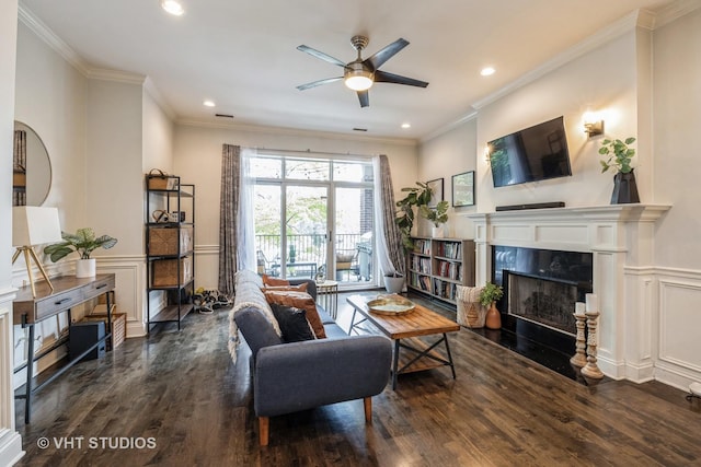 4220 S King Dr Unit 2S, Chicago, IL 60653 - living room featuring a ceiling fan, a fireplace, a decorative wall, and wood finished floors