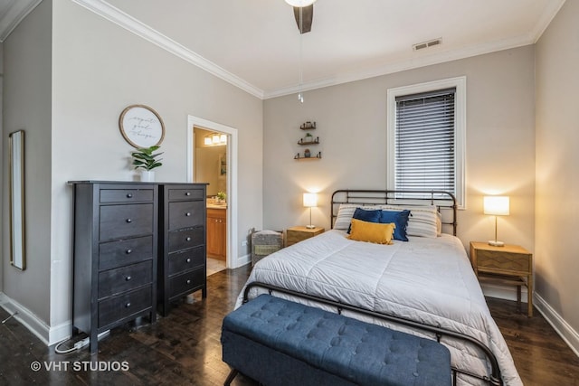 4220 S King Dr Unit 2S, Chicago, IL 60653 - bedroom with visible vents, ornamental molding, baseboards, dark wood-style floors, and ensuite bath