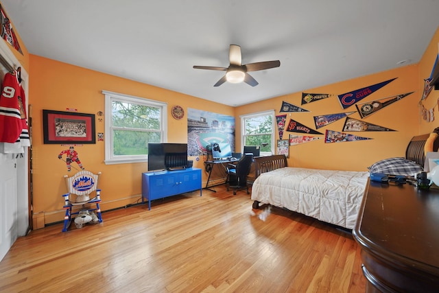 227 Abbott Pl, Tower Lakes, IL 60010 - bedroom with wood finished floors, multiple windows, a desk, and a ceiling fan