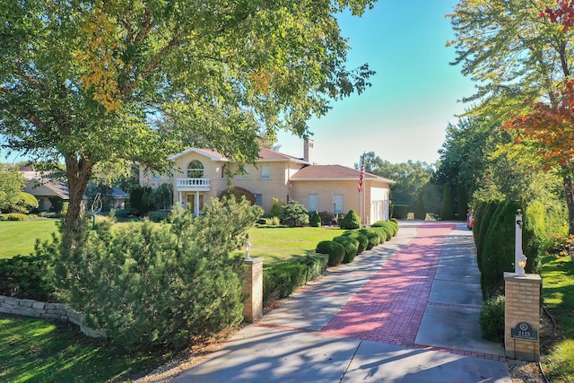 2125 Harrow Gate Dr, Inverness, IL 60010 - view of front of property featuring a front lawn and a chimney