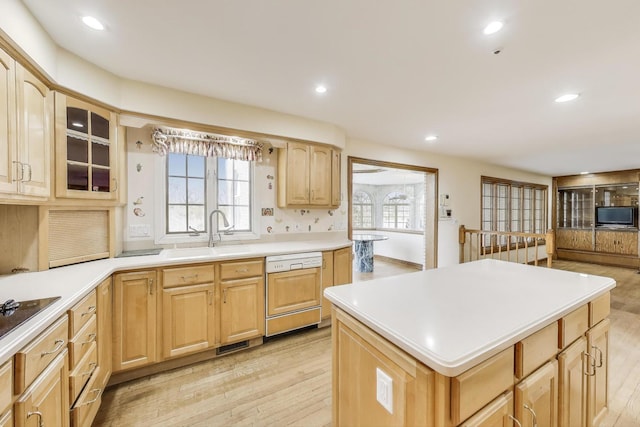 2125 Harrow Gate Dr, Inverness, IL 60010 - kitchen featuring a sink, dishwashing machine, light wood finished floors, light brown cabinets, and recessed lighting
