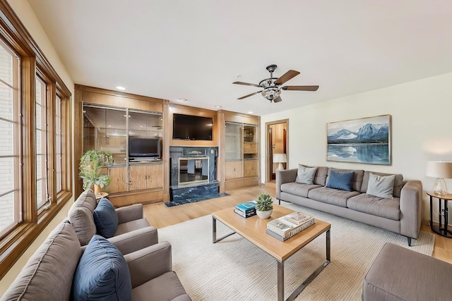 2125 Harrow Gate Dr, Inverness, IL 60010 - living area featuring light wood-type flooring, a ceiling fan, a fireplace, and recessed lighting