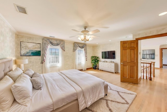 2125 Harrow Gate Dr, Inverness, IL 60010 - bedroom featuring wallpapered walls, visible vents, ornamental molding, and light wood-type flooring