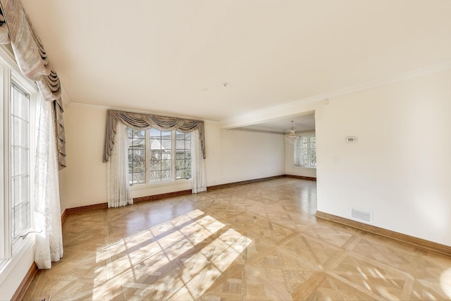 2125 Harrow Gate Dr, Inverness, IL 60010 - unfurnished room featuring baseboards, visible vents, and plenty of natural light
