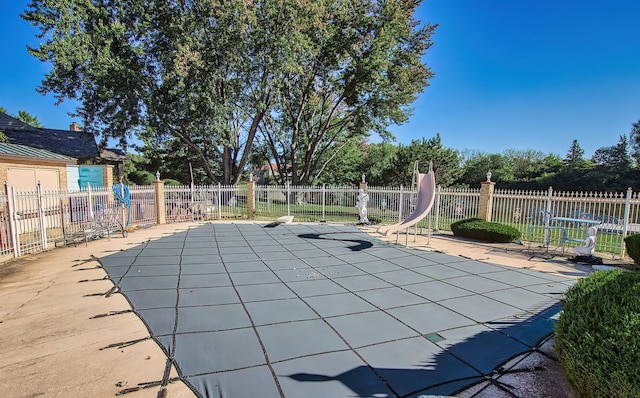 2125 Harrow Gate Dr, Inverness, IL 60010 - view of pool featuring fence, a fenced in pool, a water slide, and a patio area