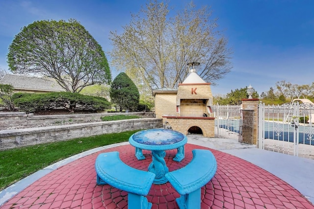 2125 Harrow Gate Dr, Inverness, IL 60010 - view of patio / terrace featuring an outdoor brick fireplace