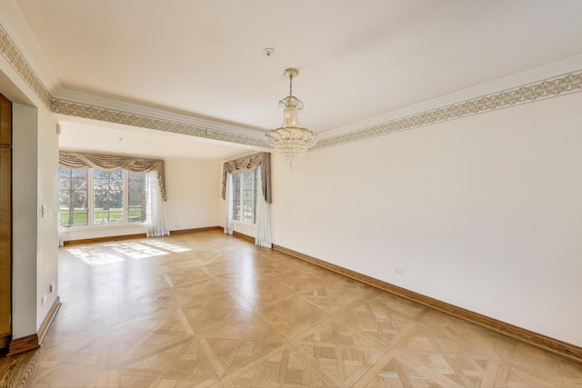 2125 Harrow Gate Dr, Inverness, IL 60010 - spare room featuring baseboards, an inviting chandelier, and ornamental molding