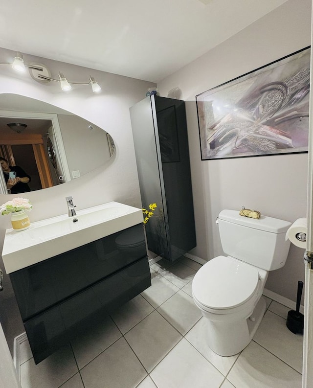 1572 Brandywyn Ln, Buffalo Grove, IL 60089 - half bath featuring vanity, baseboards, tile patterned flooring, and toilet