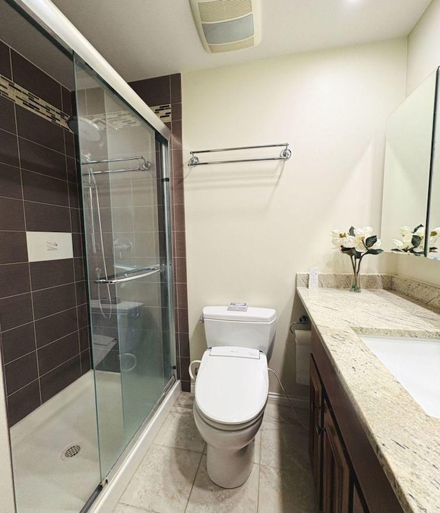 1572 Brandywyn Ln, Buffalo Grove, IL 60089 - bathroom featuring visible vents, tile patterned flooring, a shower stall, vanity, and toilet