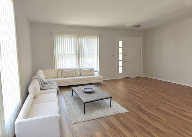 1572 Brandywyn Ln, Buffalo Grove, IL 60089 - living area with baseboards and wood finished floors