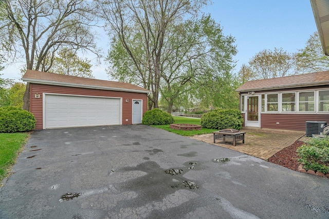 garage featuring central AC unit