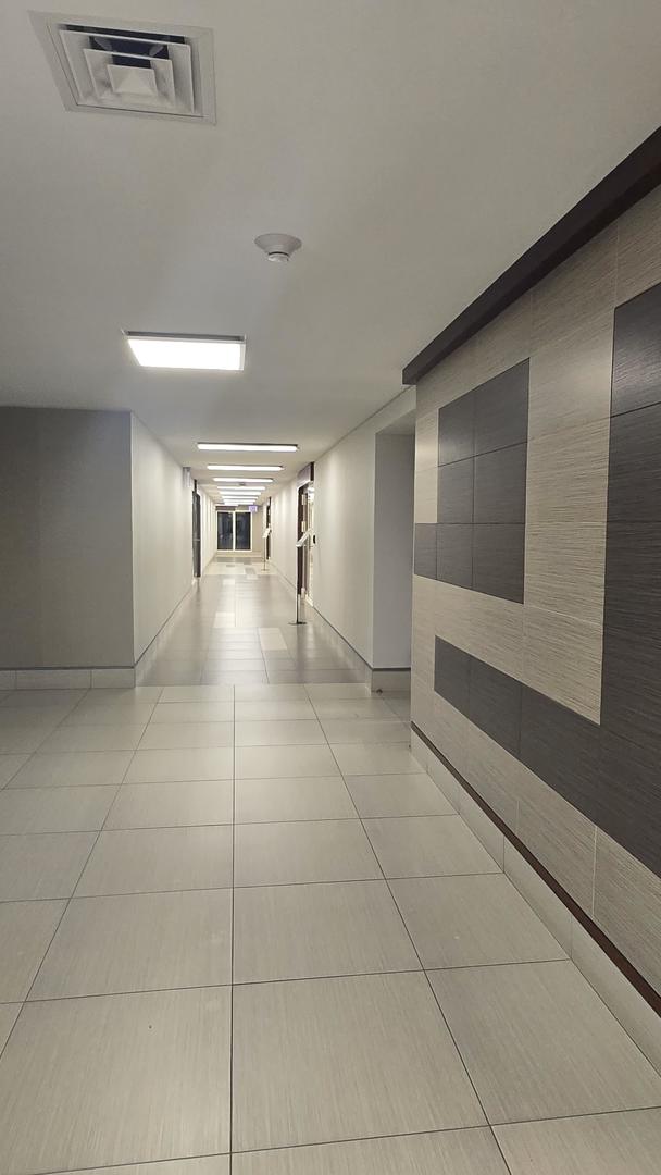 400 E Randolph St Unit 921, Chicago, IL 60601 - hall featuring light tile patterned floors and visible vents